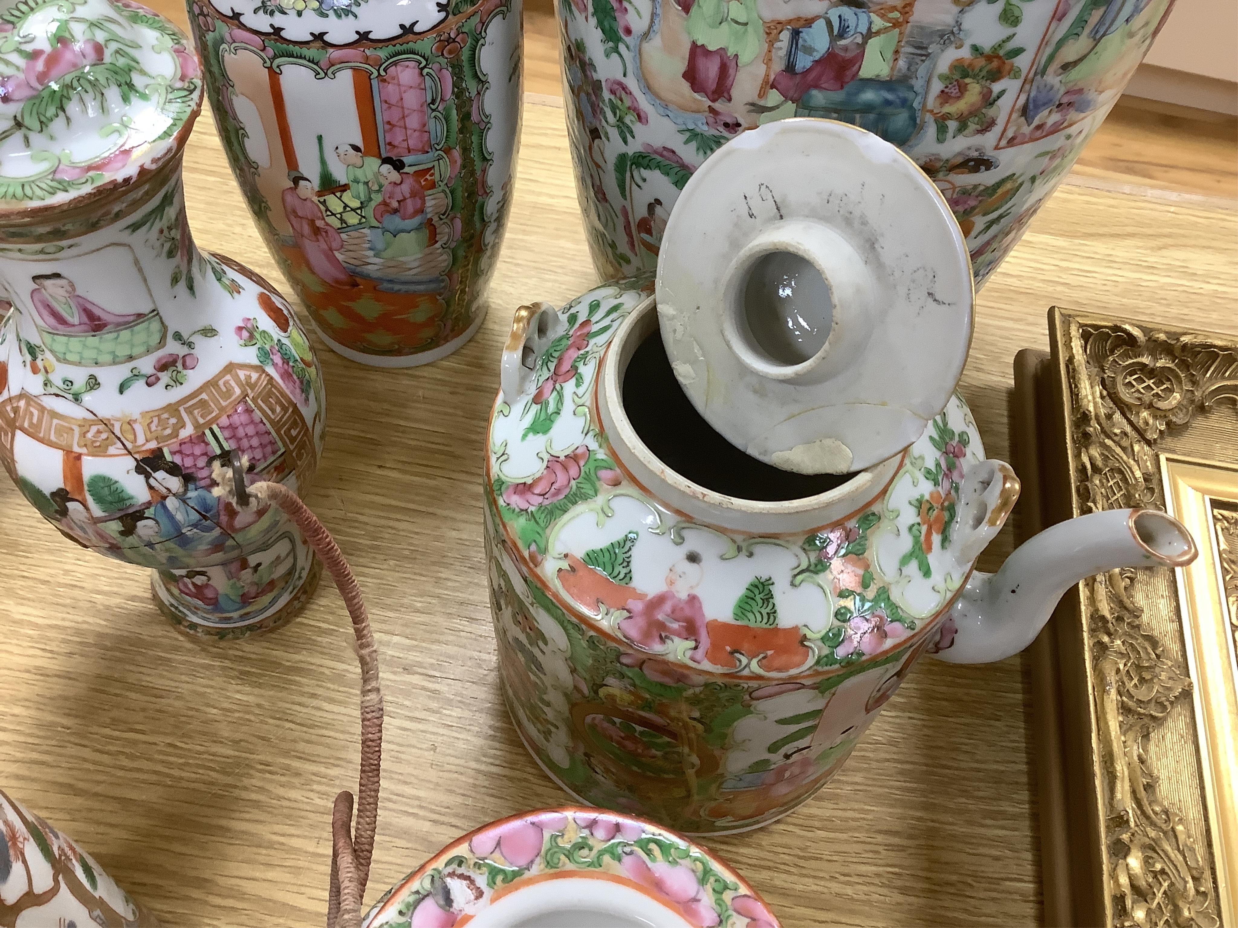 A group of 19th century and later Chinese famille rose porcelain vases and teapots, tallest 39cm high. Condition - poor